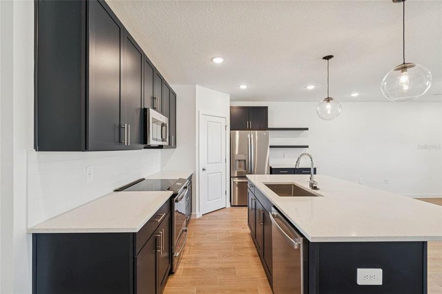 Furnished interior view inside a new home in Aspire at Canter Creek, Davenport (Image 8).