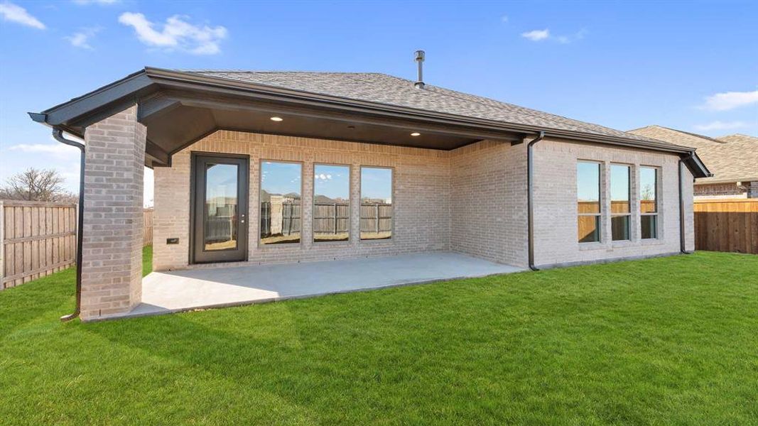 Exterior details and patio area of a home in Devonshire - Reserve 50', Forney (Image 3). Exterior details and patio area of a home in Devonshire - Reserve 50', Forney (Image 3).
