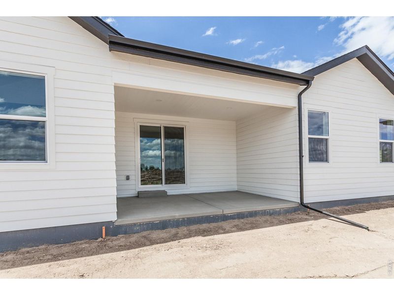 Exterior details and patio area of a home in Prairie Song Story Collection - Single Family Homes, Windsor (Image 28).