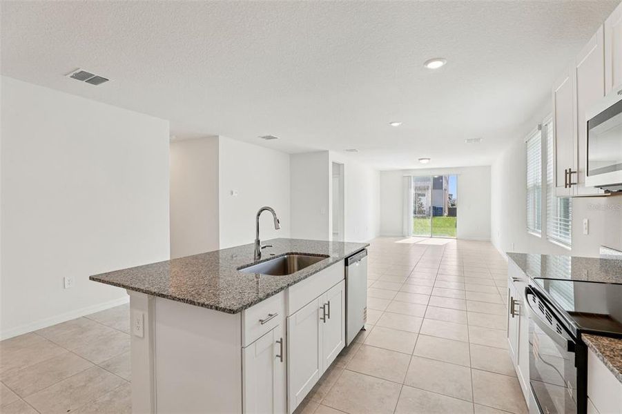 Furnished interior view inside a new home in Lawson Dunes - Signature Series, Haines City (Image 9).