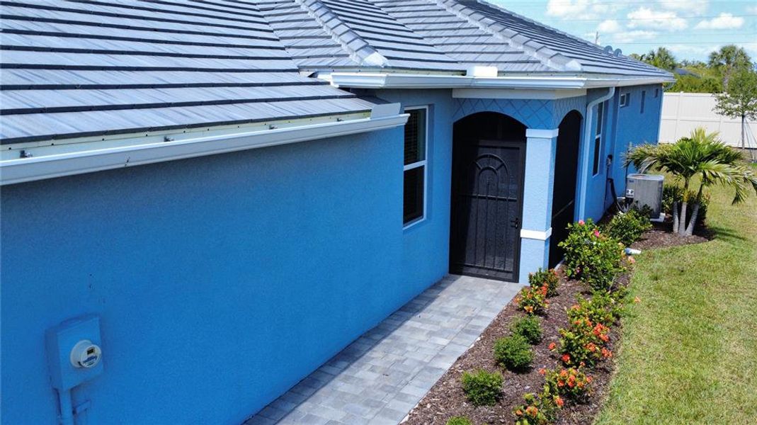 Exterior details and patio area of a home in Palm Lake at Coco Bay, Englewood (Image 21). Exterior details and patio area of a home in Palm Lake at Coco Bay, Englewood (Image 21).