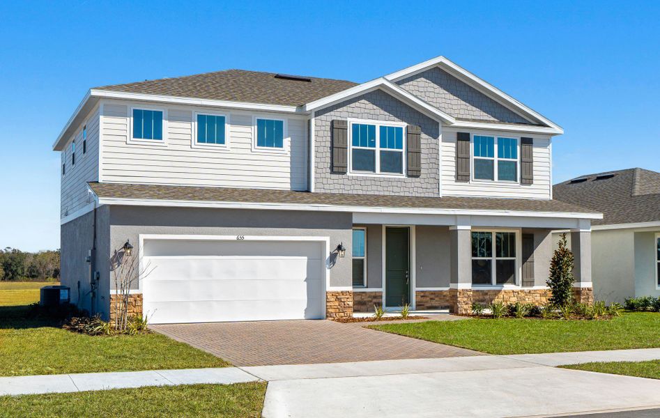 Representative exterior photo of a completed home built from the Clementine by Hartizen Homes in Eden Crest Single Family Homes, Apopka, FL (Image 25).