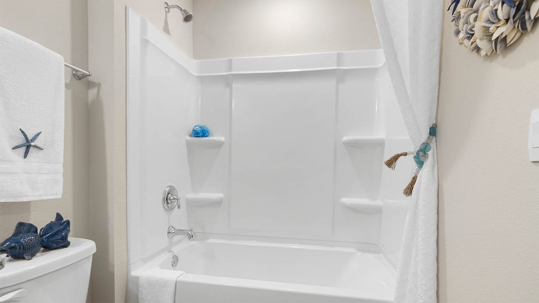 Representative furnished interior of a home built from the Palm Exterior by D.R. Horton in Hawks Landing Townhomes, Santa Rosa Beach (Image 28).