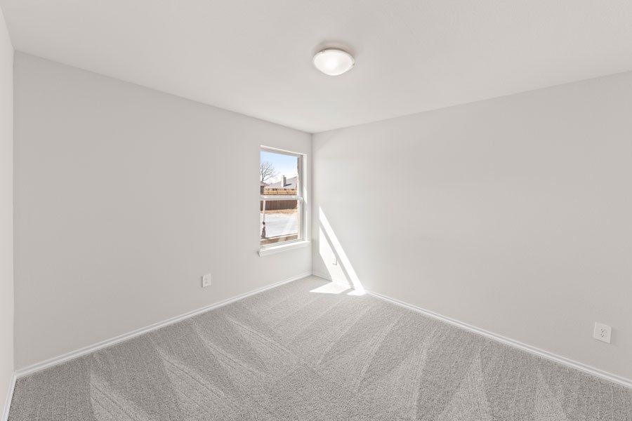 Representative exterior photo of a completed home built from the Lincoln by Impression Homes in Northspur, Terrell, TX (Image 14).