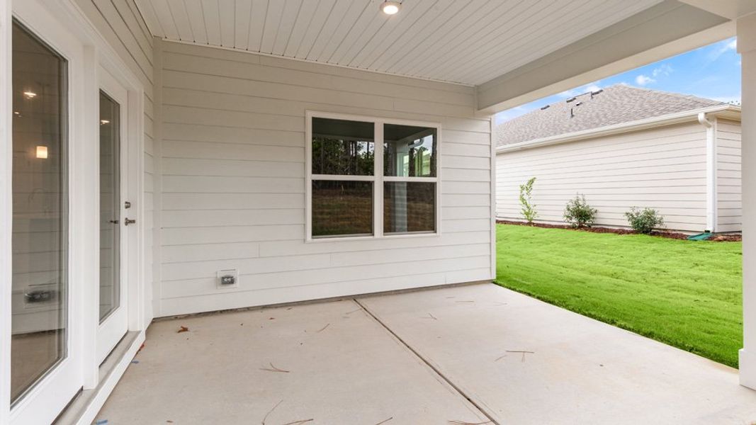 Exterior details and patio area of a home in The Villas at Martin Farms, Aberdeen (Image 19).