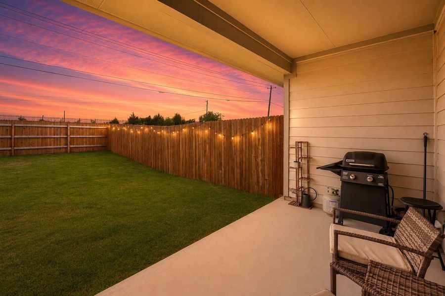 Covered concrete patio with a plank-style siding exterior Covered concrete patio with a plank-style siding exterior