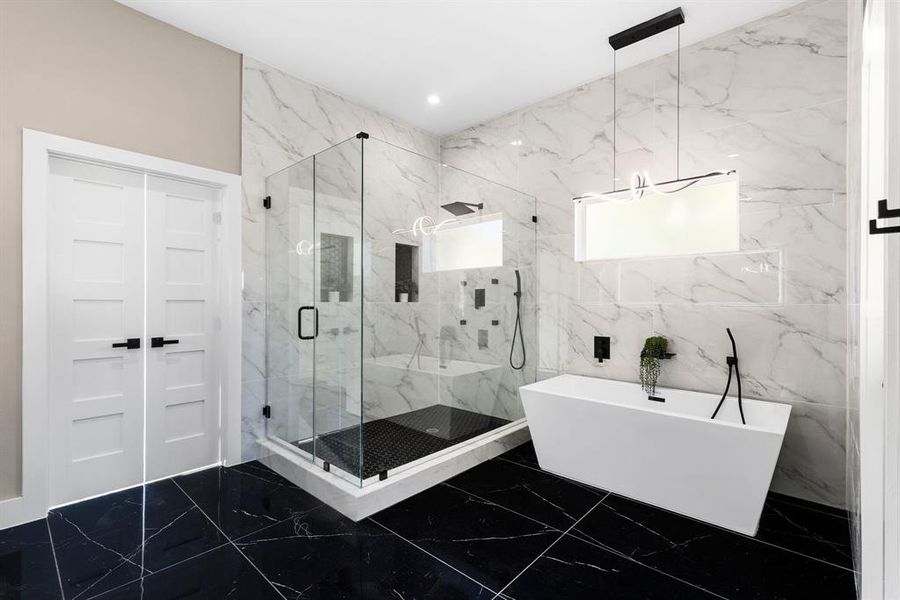 Bathroom with separate shower and tub and tile walls