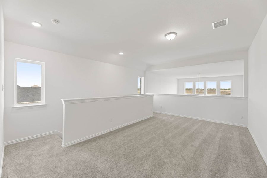 Representative unfurnished interior of a home built from the Walton by UnionMain Homes in Elevon, Lavon (Image 33).