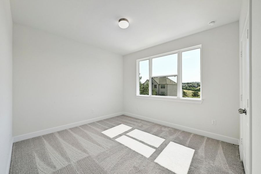 Spacious, unfurnished interior of a new home in Lakeside at Tessera, Lago Vista (Image 34).