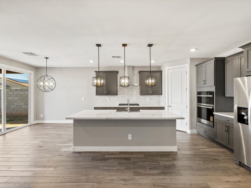 Furnished interior view inside a new home in Blossom Rock Reserve Series, Apache Junction (Image 3).