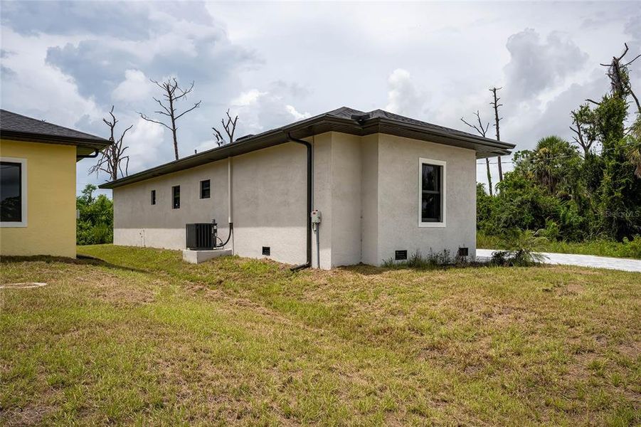 Front exterior of a new home in , Rotonda West, FL, highlighting curb appeal (Image 28).
