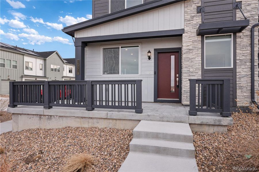 Exterior details and patio area of a home in Whisper Village, Arvada (Image 3).