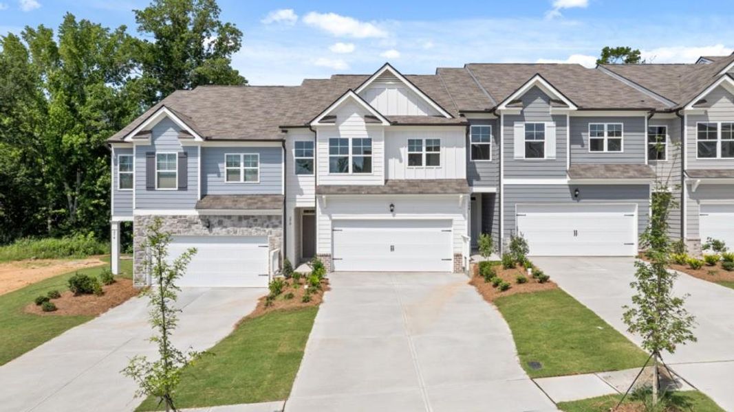 Front exterior of a new home in Rolling Meadows, Jasper, GA, highlighting curb appeal (Image 2). Front exterior of a new home in Rolling Meadows, Jasper, GA, highlighting curb appeal (Image 2).