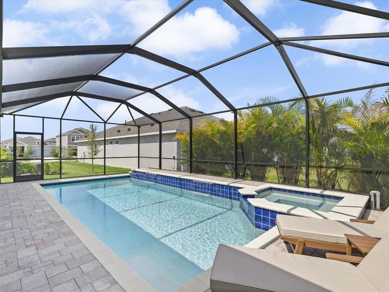 Exterior details and patio area of a home in Waterset, Apollo Beach (Image 28).