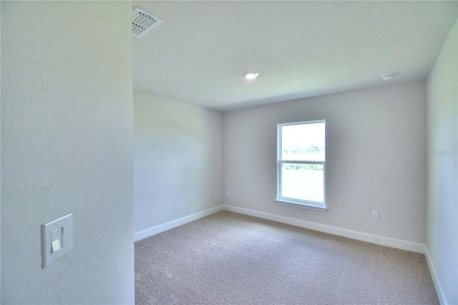 Spacious, unfurnished interior of a new home in Cadence Crossing, Auburndale (Image 35).