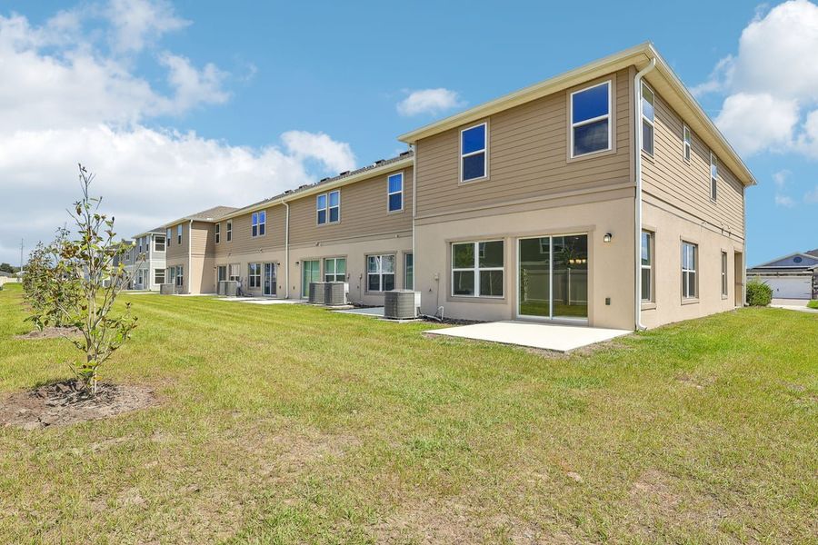 Exterior details and patio area of a home in Reserve at Forest Lake Townhomes, Lake Wales (Image 3). Exterior details and patio area of a home in Reserve at Forest Lake Townhomes, Lake Wales (Image 3).