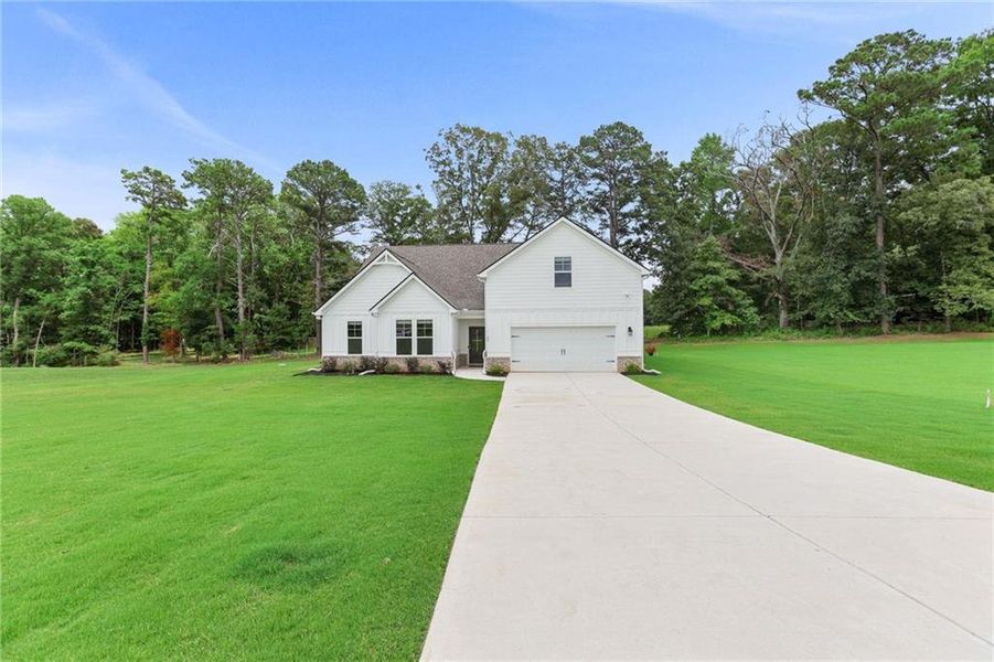Front exterior of a new home in , Moreland, GA, highlighting curb appeal (Image 26). Front exterior of a new home in , Moreland, GA, highlighting curb appeal (Image 26).