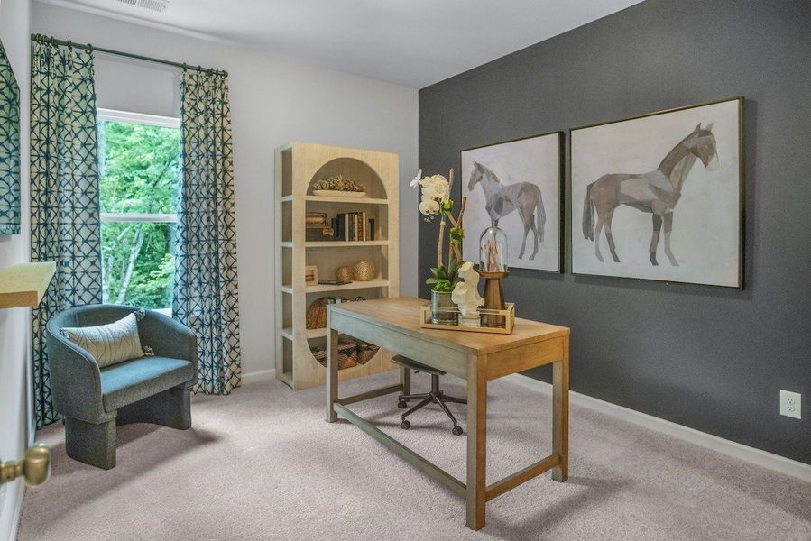 This picture is from our furnished and decorated model home in the community.  Window placement and color scheme may vary per unit location.  Ask agent for more specific details regarding color and options