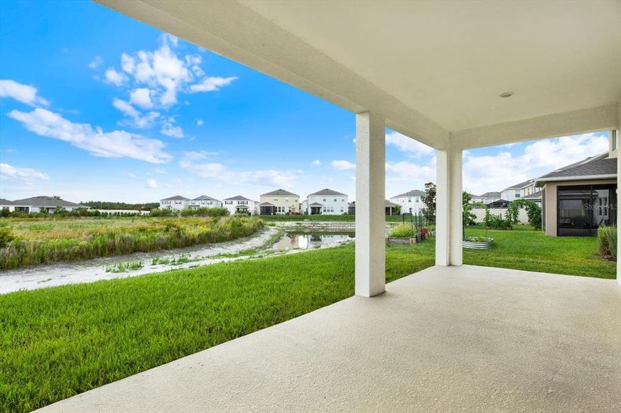 Exterior details and patio area of a home in Woodcreek, Wesley Chapel (Image 30).