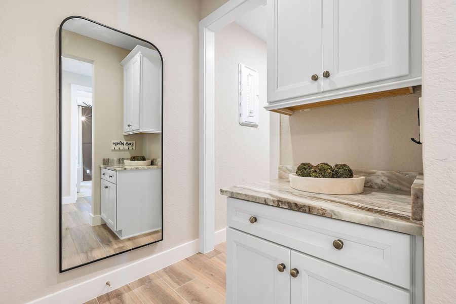 Representative furnished interior of a home built from the Charlotte by William Ryan Homes in The Sanctuary – Royal Collection, Punta Gorda (Image 11). Representative furnished interior of a home built from the Charlotte by William Ryan Homes in The Sanctuary – Royal Collection, Punta Gorda (Image 11).