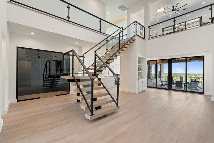 Spacious, unfurnished interior of a new home in Milky Way at River Place, Austin (Image 24).