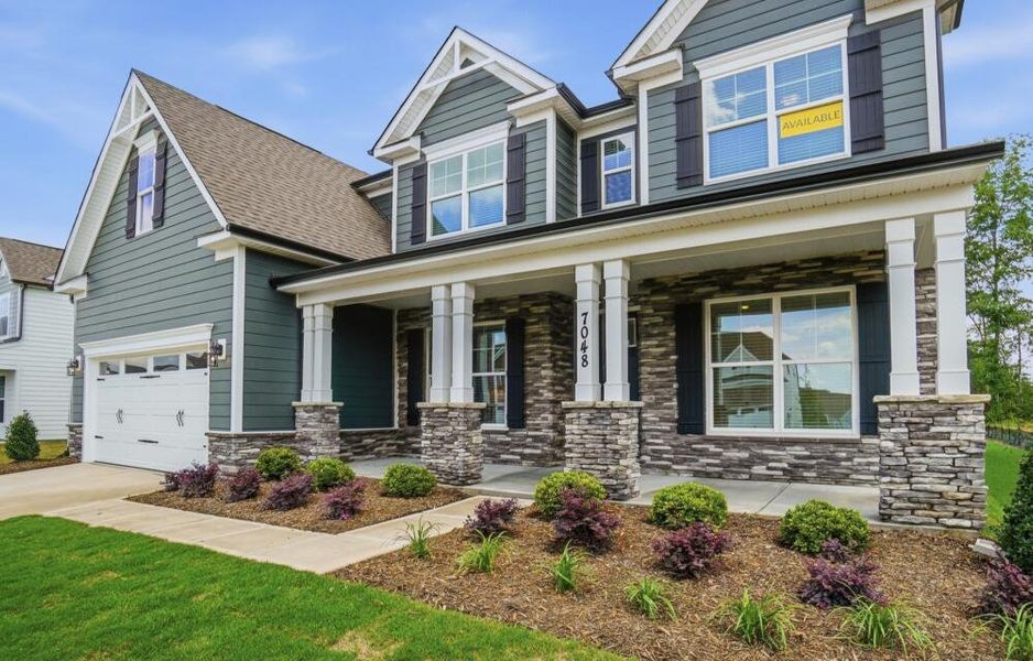 Front exterior of a new home in Harmony, Harrisburg, NC, highlighting curb appeal (Image 2). Front exterior of a new home in Harmony, Harrisburg, NC, highlighting curb appeal (Image 2).