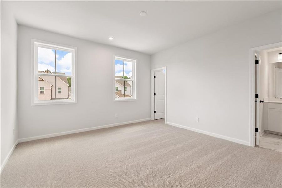 Spacious, unfurnished interior of a new home in The Paddocks at Doc Hughes, Buford (Image 35).