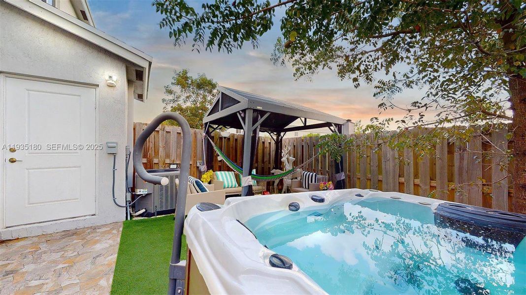 Exterior details and patio area of a home in , Florida City (Image 24).