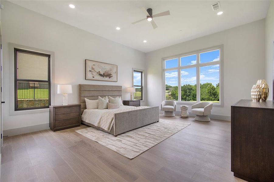 Bedroom featuring light wood-type flooring, recessed lighting, and ceiling fan