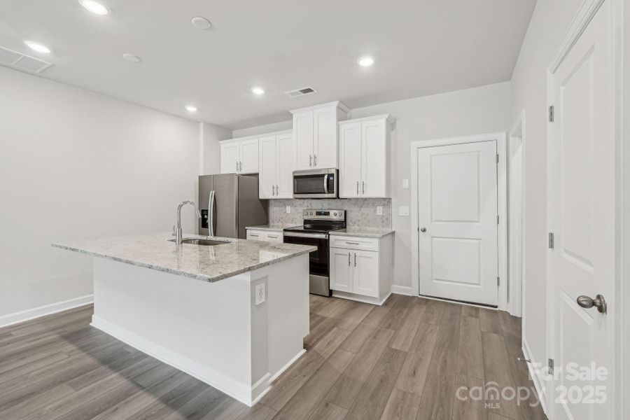 Photo is not of the actual home, but is an inspirational photo of builder’s model home and may depict options, furnishings, and/or decorator features that are not included