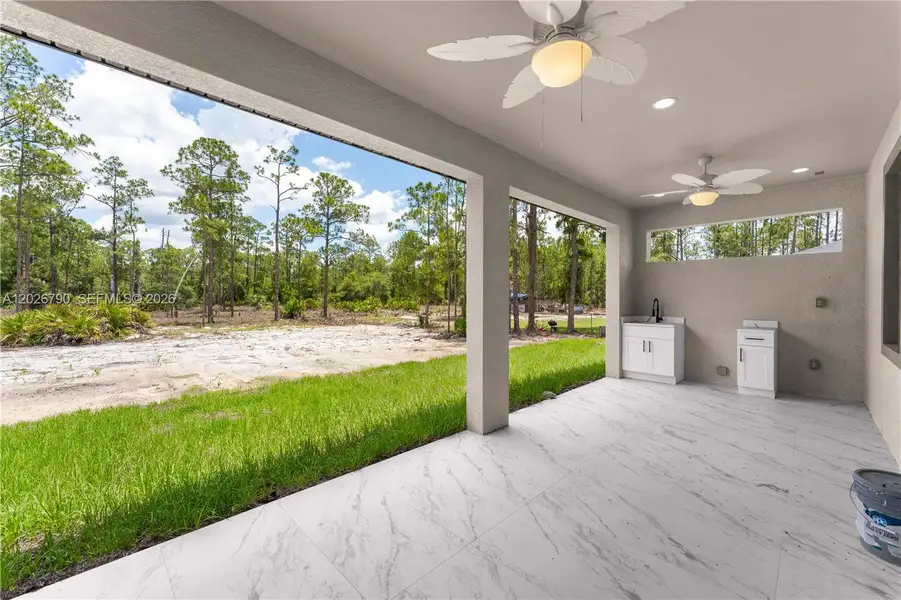 Exterior details and patio area of a home in , Lehigh Acres (Image 3).