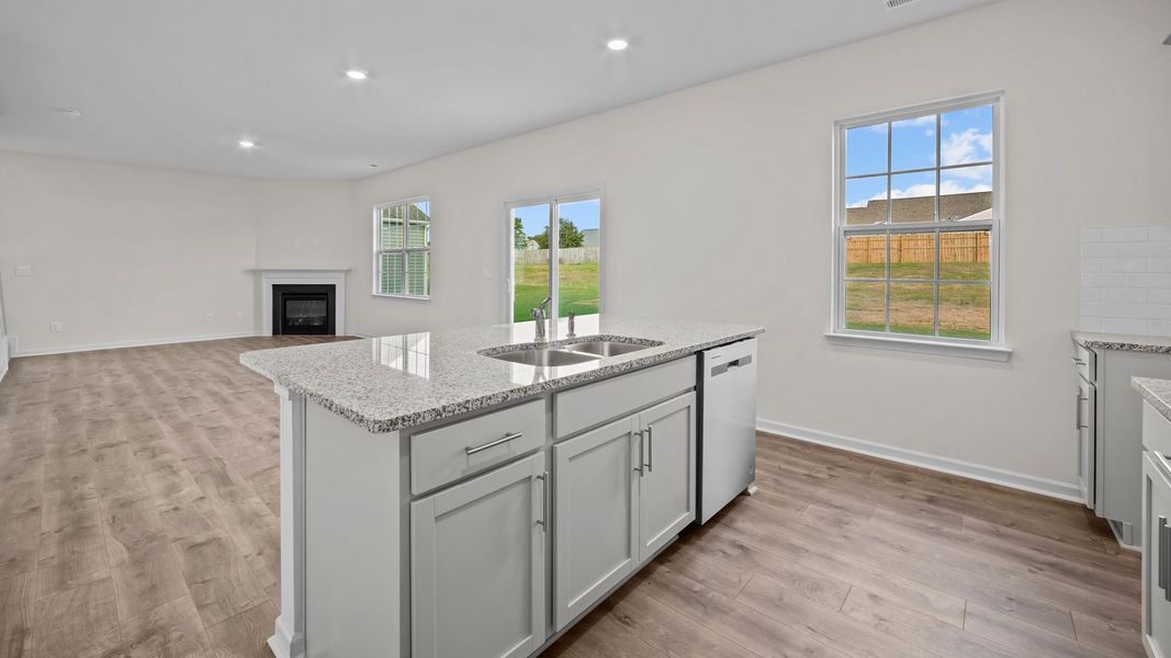 Representative furnished interior of a home built from the PENWELL by D.R. Horton in Bedford Place, Wilson (Image 16).