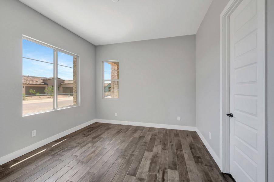 Spacious, unfurnished interior of a new home in Blossom Rock, Apache Junction (Image 40). Spacious, unfurnished interior of a new home in Blossom Rock, Apache Junction (Image 40).