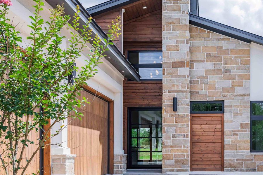 Front exterior of a new home in , Horseshoe Bay, TX, highlighting curb appeal (Image 23). Front exterior of a new home in , Horseshoe Bay, TX, highlighting curb appeal (Image 23).