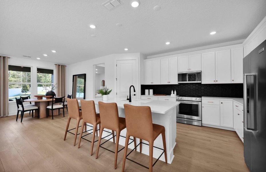 Representative furnished interior of a home built from the Mystique by Pulte Homes in Murray Farms, Middleburg (Image 11).