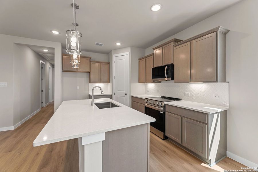 Furnished interior view inside a new home in Highland Ridge, New Braunfels (Image 7).