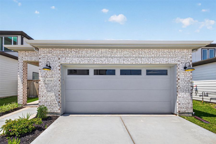 Front exterior of a new home in , Stafford, TX, highlighting curb appeal (Image 26). Front exterior of a new home in , Stafford, TX, highlighting curb appeal (Image 26).