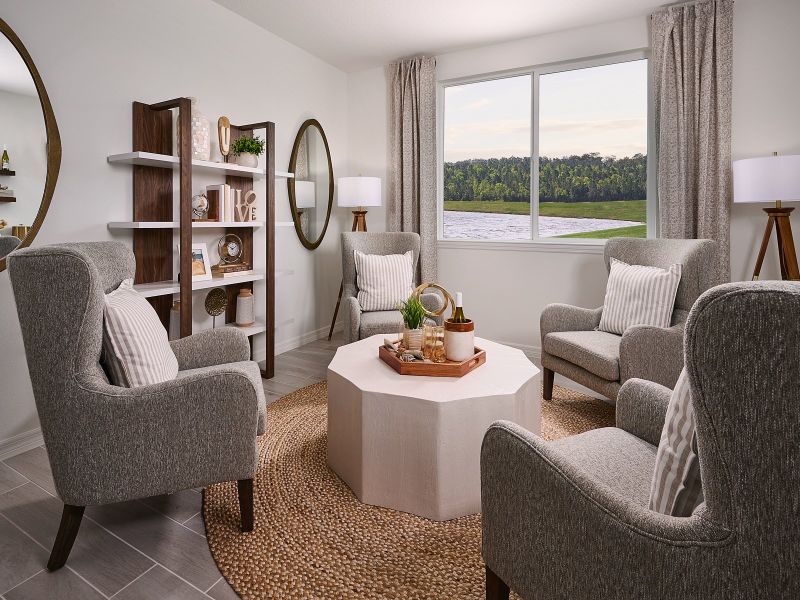 Furnished interior view inside a new home in Oakfield Trails - Signature Series, Parrish (Image 11).