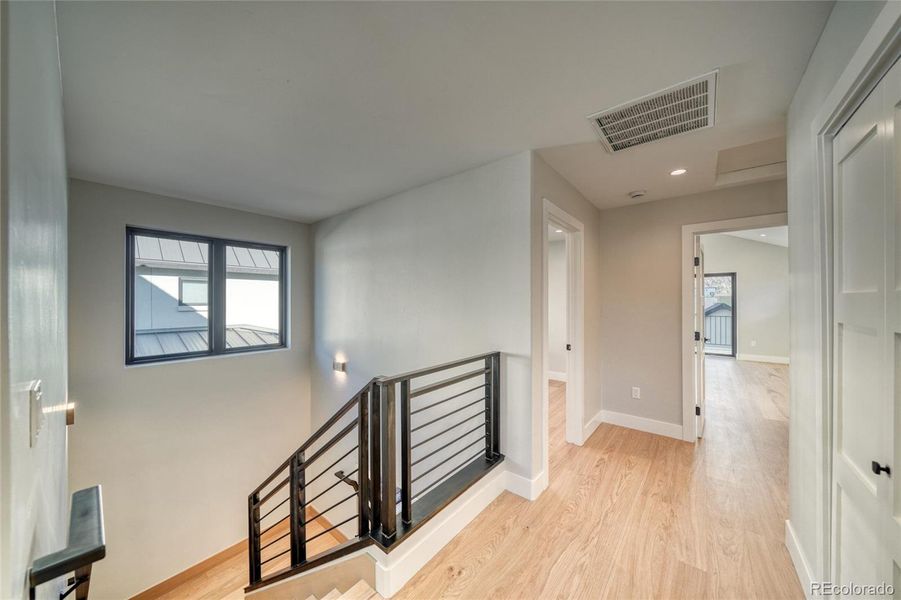 Upstairs Landing / Engineered Hardwood Floors Throughout