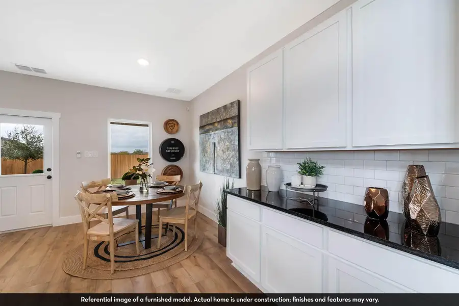 Furnished interior view inside a new home in Caney Mills, Conroe (Image 7).