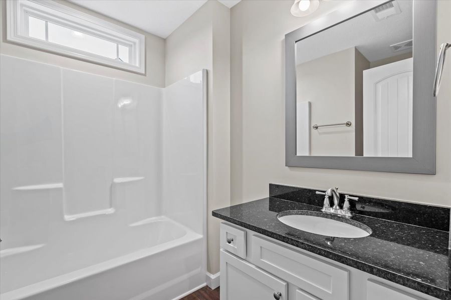 Representative furnished interior of a home built from the Arcadia by Enchanted Homes in Guadalupe Heights, Seguin (Image 11).