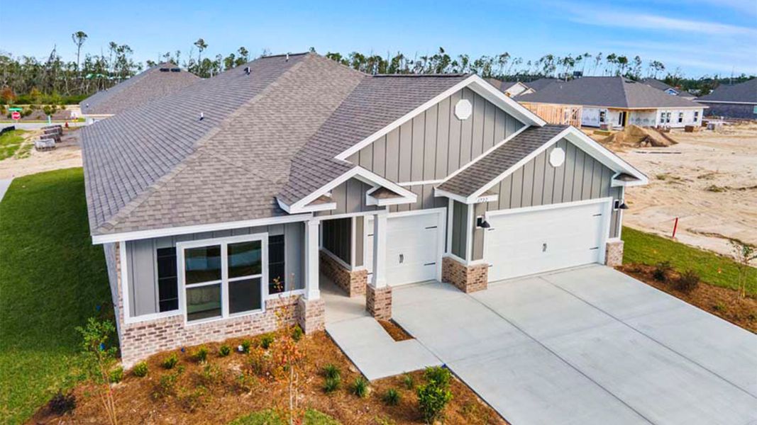 Front exterior of a new home in Liberty, Panama City, FL, highlighting curb appeal (Image 23).