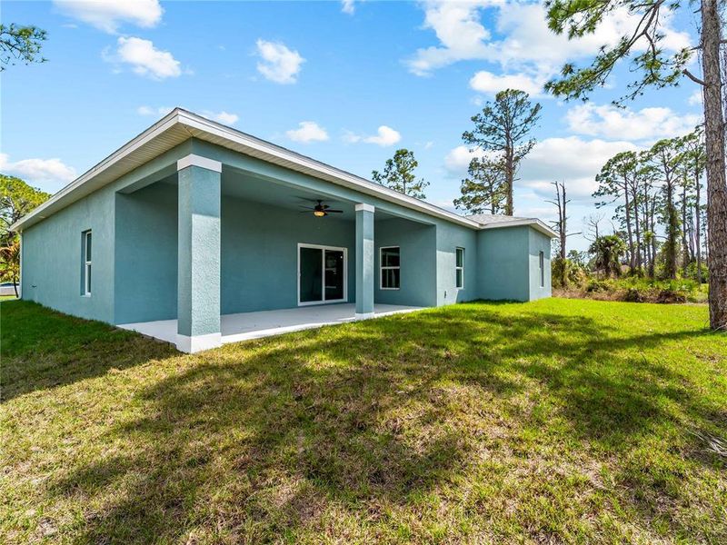 Exterior details and patio area of a home in , North Port (Image 31).