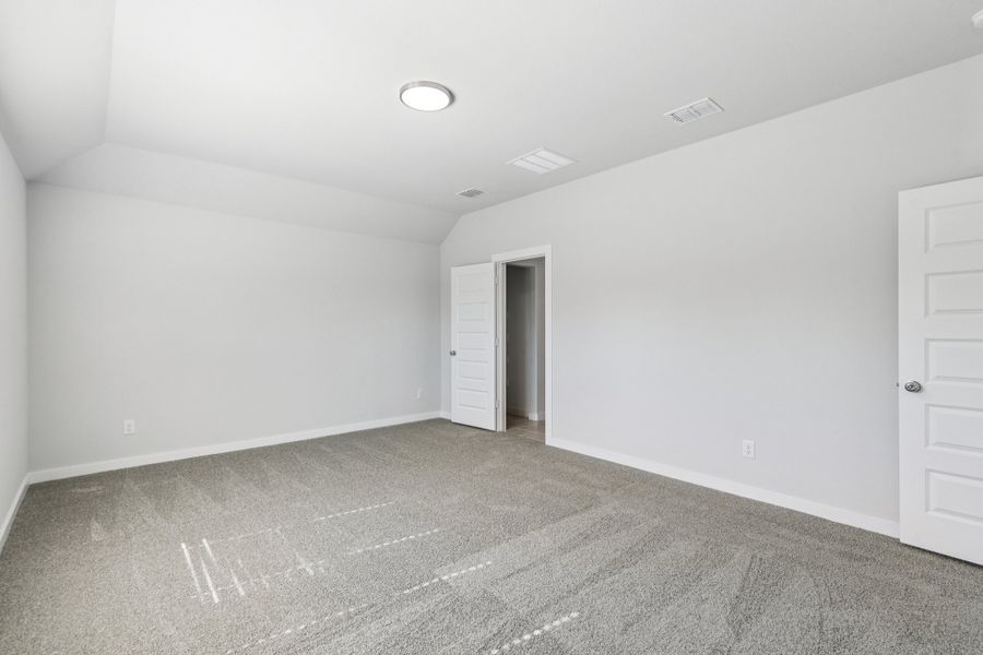 Primary Suite in the Oscar home plan by Trophy Signature Homes – REPRESENTATIVE PHOTO Primary Suite in the Oscar home plan by Trophy Signature Homes – REPRESENTATIVE PHOTO