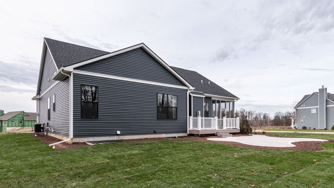 Exterior details and patio area of a home in Preserve at Magnolia Park, Jackson (Image 4).