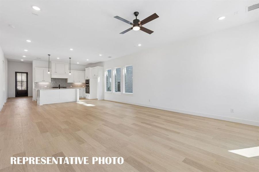 The open and flowing floor plan in our Chapelle II plan is an entertainer's dream home!  REPRESENTATIVE PHOTO