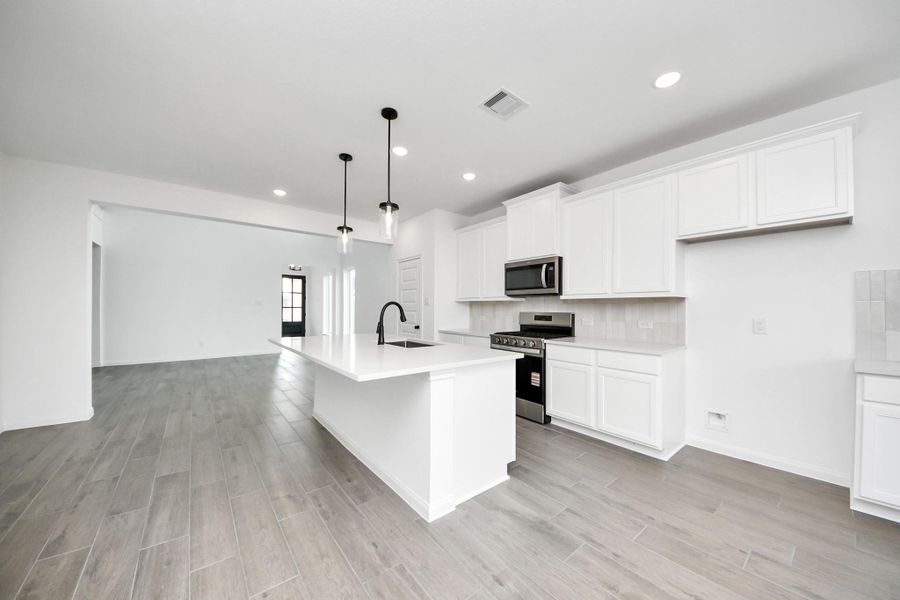 Furnished interior view inside a new home in Elyson, Katy (Image 11).