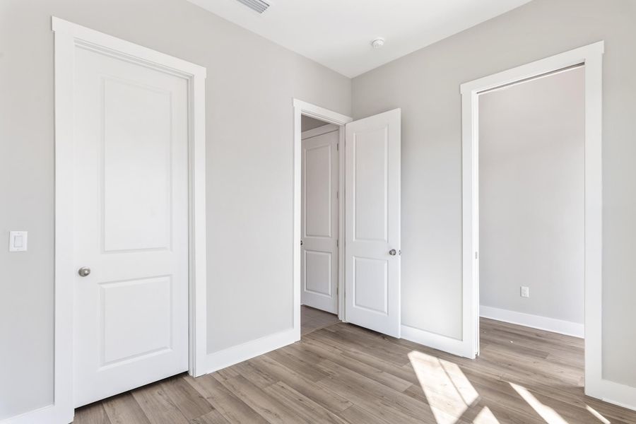 Representative unfurnished interior of a home built from the Pearl by Brock Built in Nautilus Pointe, Inlet Beach (Image 28).