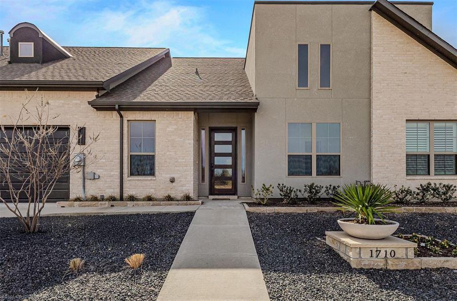 Front exterior of a new home in , Heath, TX, highlighting curb appeal (Image 1). Front exterior of a new home in , Heath, TX, highlighting curb appeal (Image 1).