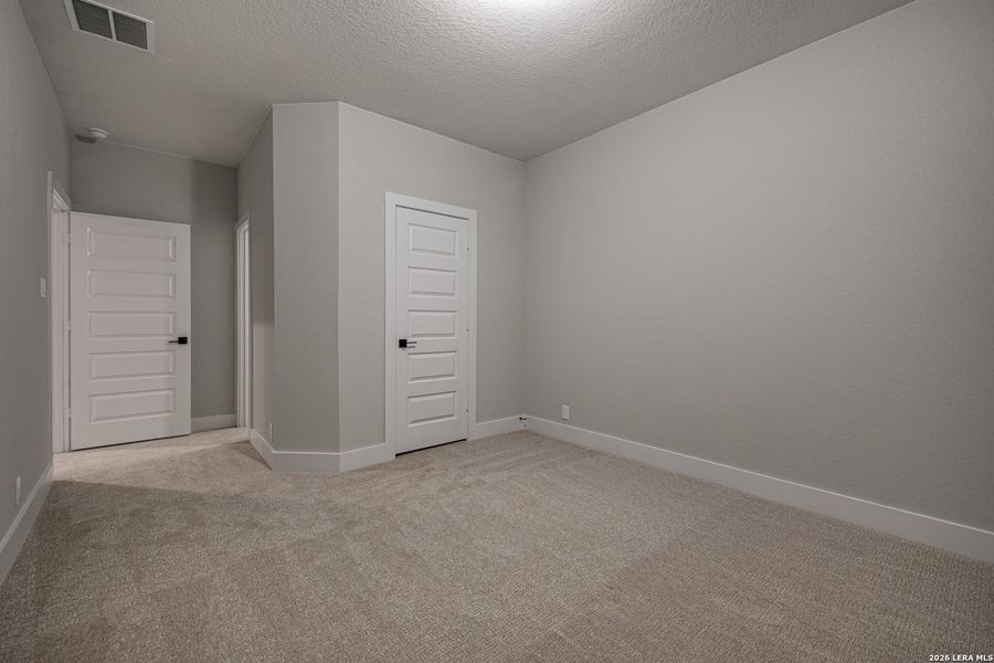Spacious, unfurnished interior of a new home in The Reserve at Potranco Oaks, Castroville (Image 31).